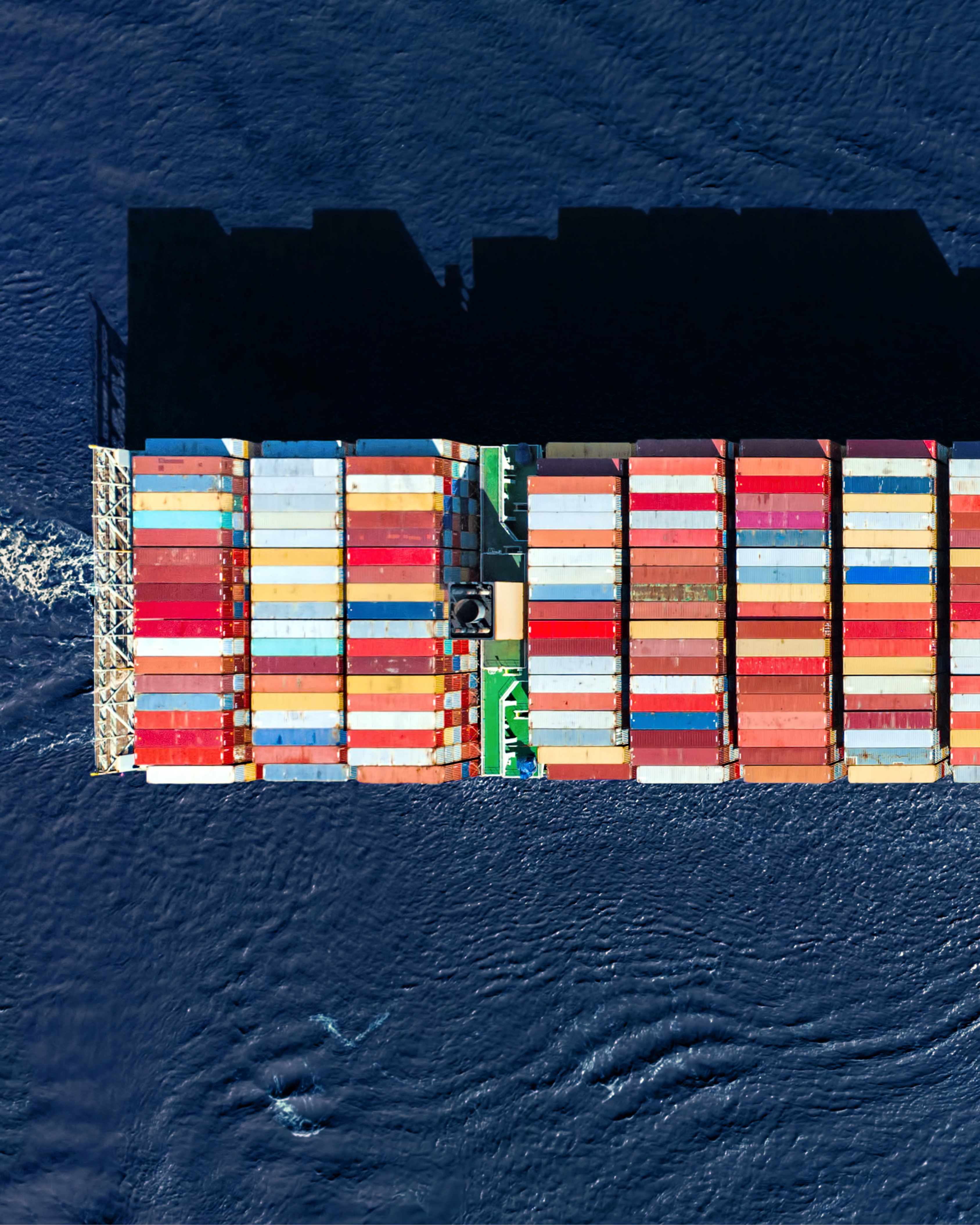 Container ship representing procurement, supply chain and business pressure.